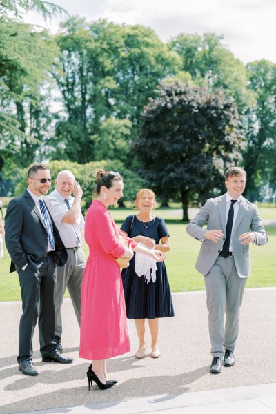 Guests wearing sunglasses outside