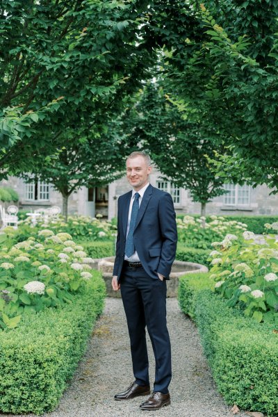 Groom on his own in garden