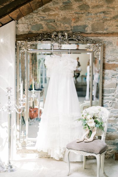 White dress hanging above