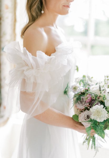 Ruffle arm off the shoulder dress/gown bridal detail flowers and earring