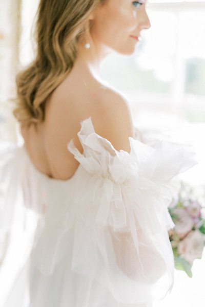 Ruffle arm off the shoulder dress/gown bridal detail