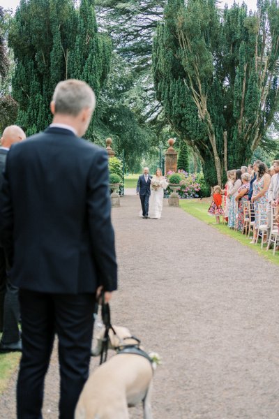 Father of the bride walks down the aisle