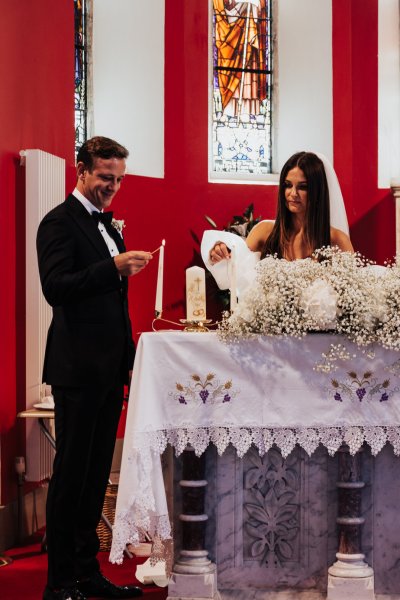 Bride and groom at the alter in church