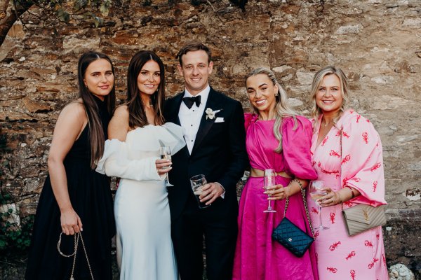 Bride with groom and guests