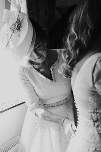 Black and white image of bride and mother