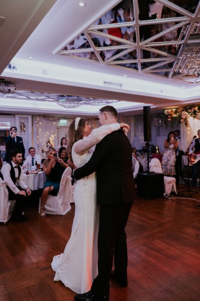 Bride and groom dance on the dancefloor