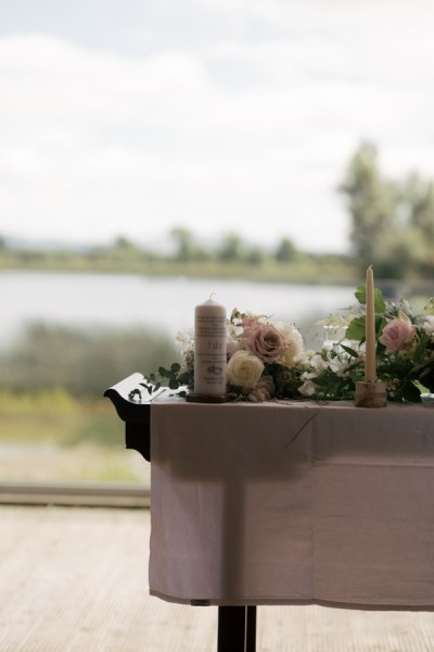 Table church setting flowers and candles