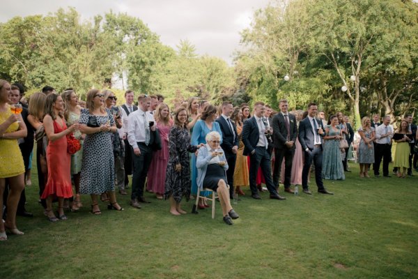 Guests in audience as they watch speeches