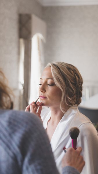 Bride getting makeup done MUA