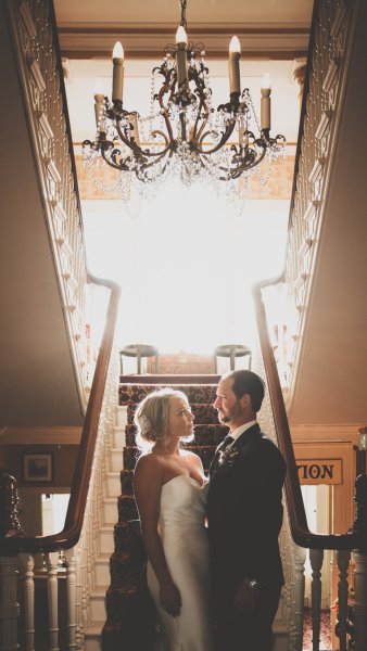 Bride and groom on the staircase