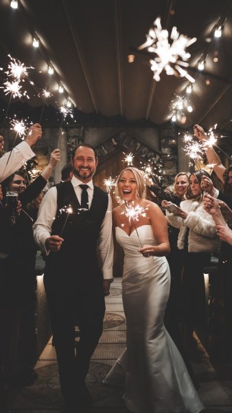 Sparklers couple bride and groom and guests