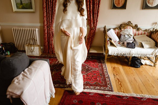 Bride getting ready in room