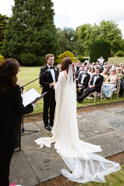 Bride and groom at alter officiant vows