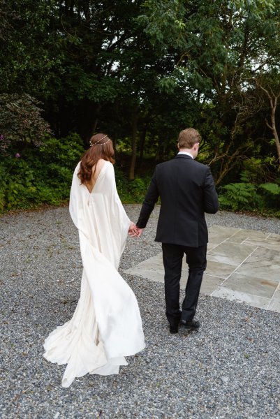 Bride and groom outside wedding venue