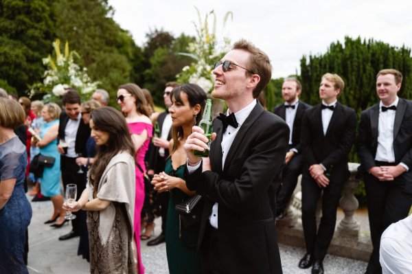 Guests watch bride and groom