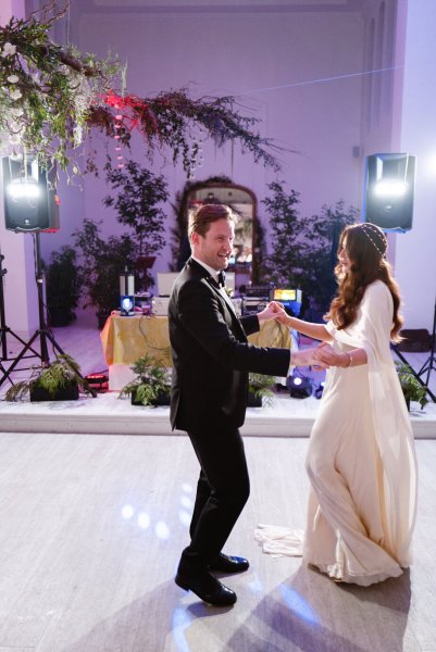 Bride and groom dance on the dancefloor