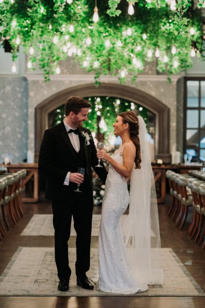 Bride and groom ceremonial room interior champagne wine prosecco