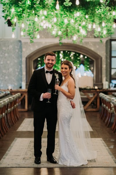 Bride and groom ceremonial room interior champagne wine prosecco