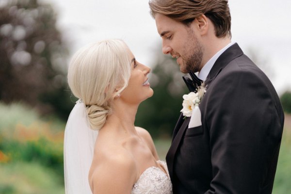 Close up of bride and groom looking at each other