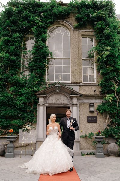 Bride and groom exterior wedding venue