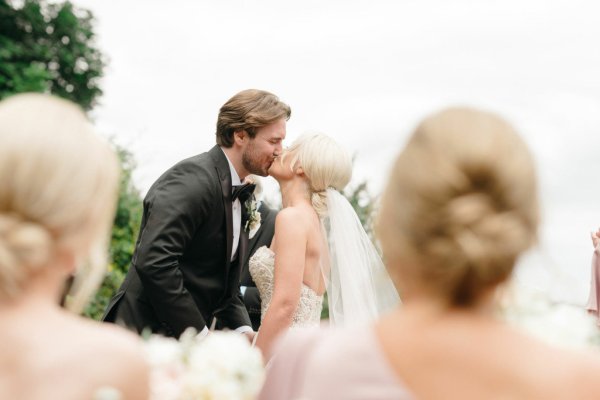 Bride and groom kissing kiss