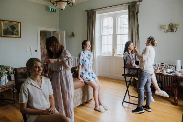 Bride and bridesmaids getting ready MUA hair