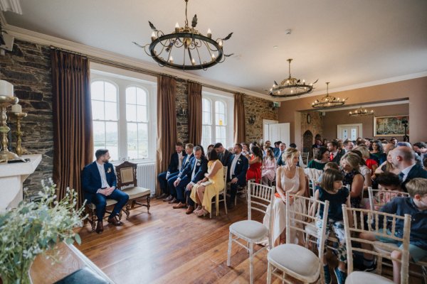 Interior detail ceremonial room with guests seated