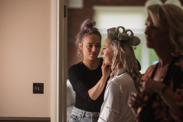 Bride getting her hair done hair stylist