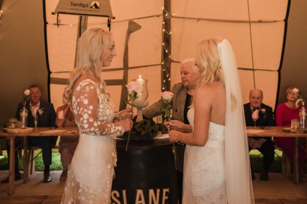 Bride and bride officiant at alter