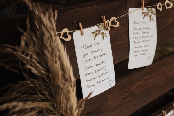 Letters notes hanging beside tree love heart decoration