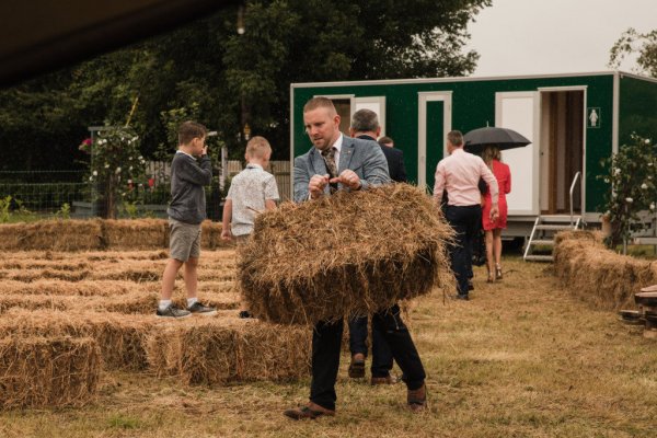 Man carrying hay farm