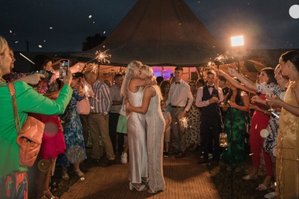 Bride and bride dancing on the dancefloor