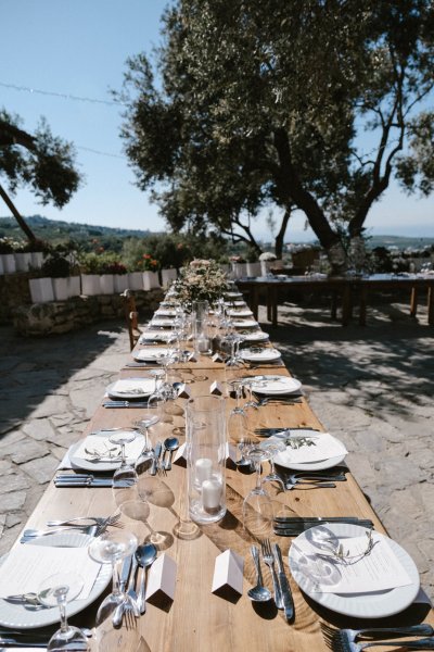 Food menu for guests table setting dining food cutlery palm trees