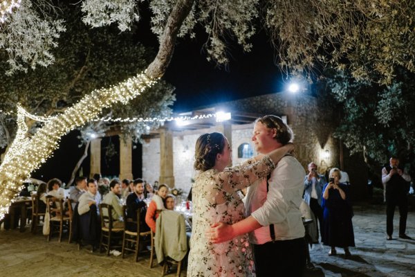 Bride and groom dance on the dancefloor