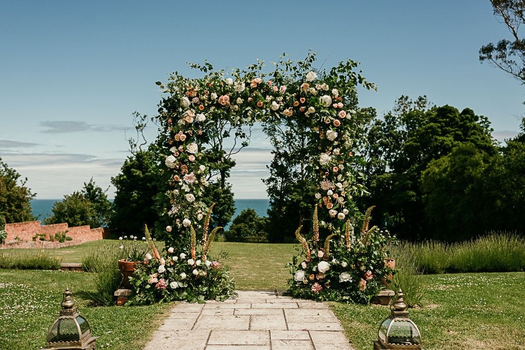 floral display at summer outdoor wedding