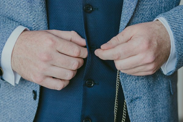 Groom in blue suit