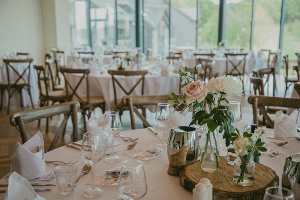 Table dining room detail roses candles and cutlery