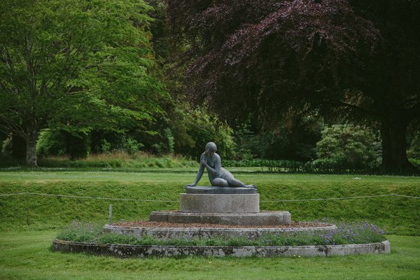 Killruddery house wedding venue grass exterior detail setting garden pond fountain woman statue