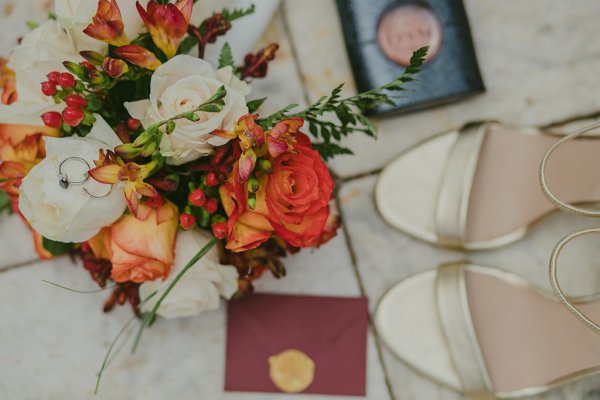 orange red flowers bridal heels and Black Opium Yves Saint Laurent perfume