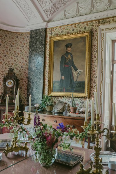 Portrait in manor house room detail and candles