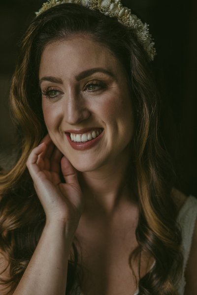 Bride smiling hair and makeup detail