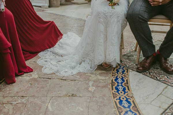 White lace dress train detail on floor