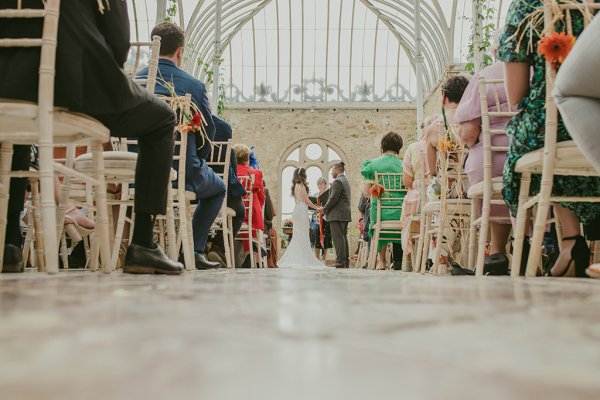 Floor view POV of bride and groom at alter