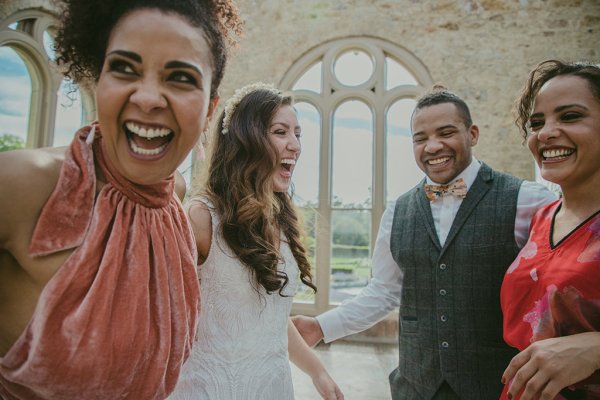 Groom mother and bride laughing laugh