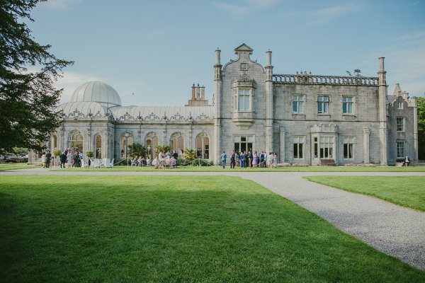 Exterior shot of wedding venue grass setting