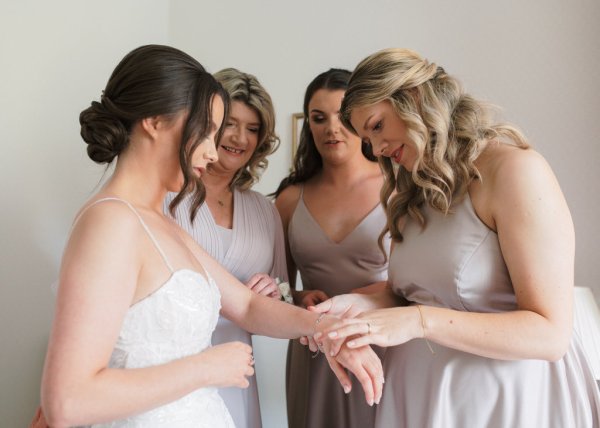 Bride and bridesmaids getting ready