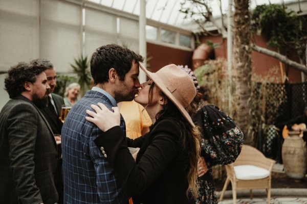 Two guests couple kiss kissing