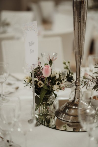 White floral decor interior dining room setting pink rose