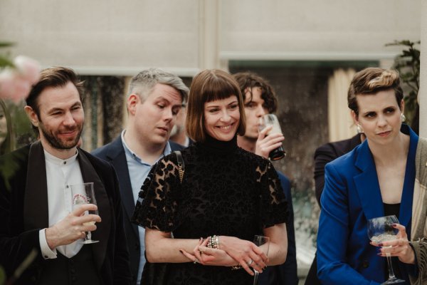 Guests seated blue suit