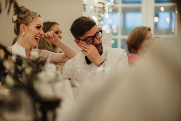 Groom cries with laughter during speech